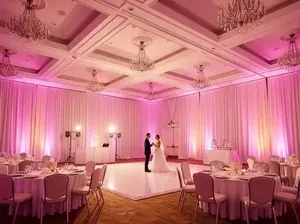 Iluminación profesional City Light en salón de boda rosa elegante - Uplighting CDMX